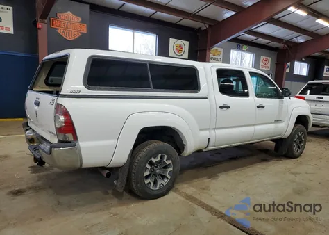2014 Toyota Tacoma V6 из США, поврежденный, VIN 3TMMU4FN9EM069953